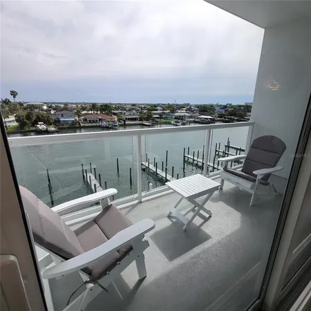 a view of a terrace with chairs