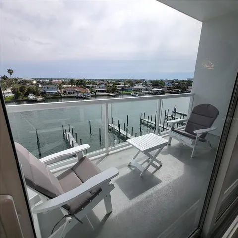 a view of a terrace with chairs