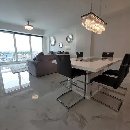 a view of a livingroom with furniture and window