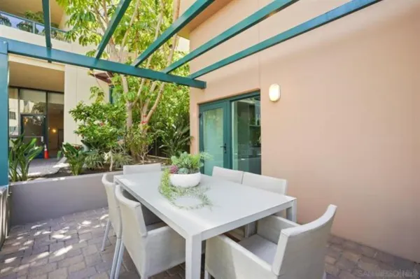 a view of an outdoor space with furniture