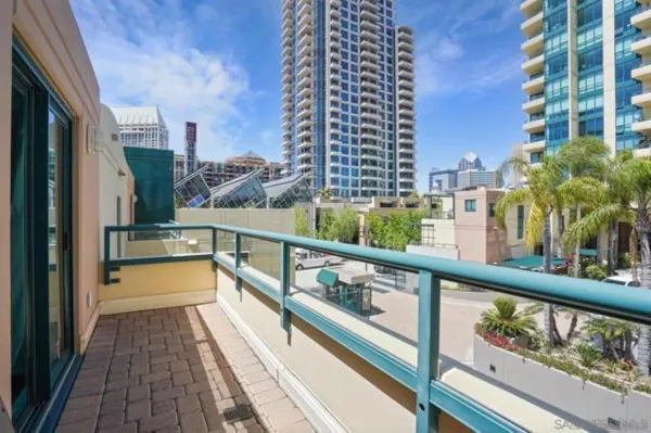 a view of balcony with outdoor seating