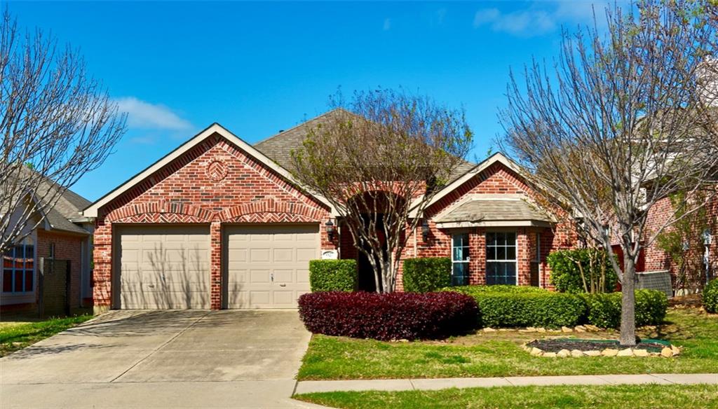 5527 Park Ridge Drive Frisco, TX 75034 - Photo 1 of 1 front view of a house with a yard