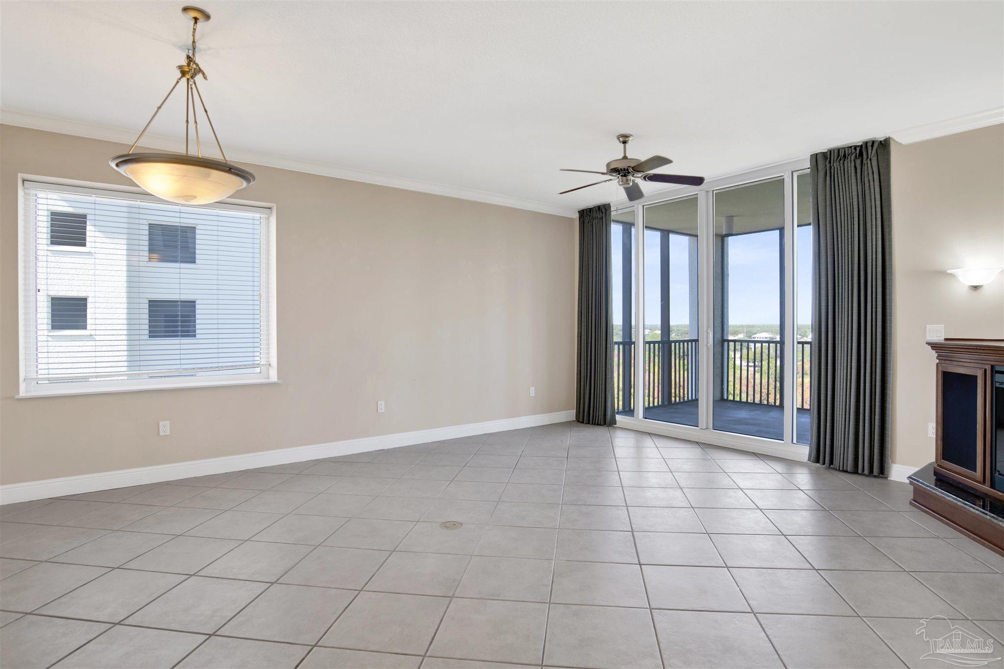 608 Lost Key Drive, Unit 701C Pensacola, FL 32507 - Photo 15 of 32 a view of an empty room with a window