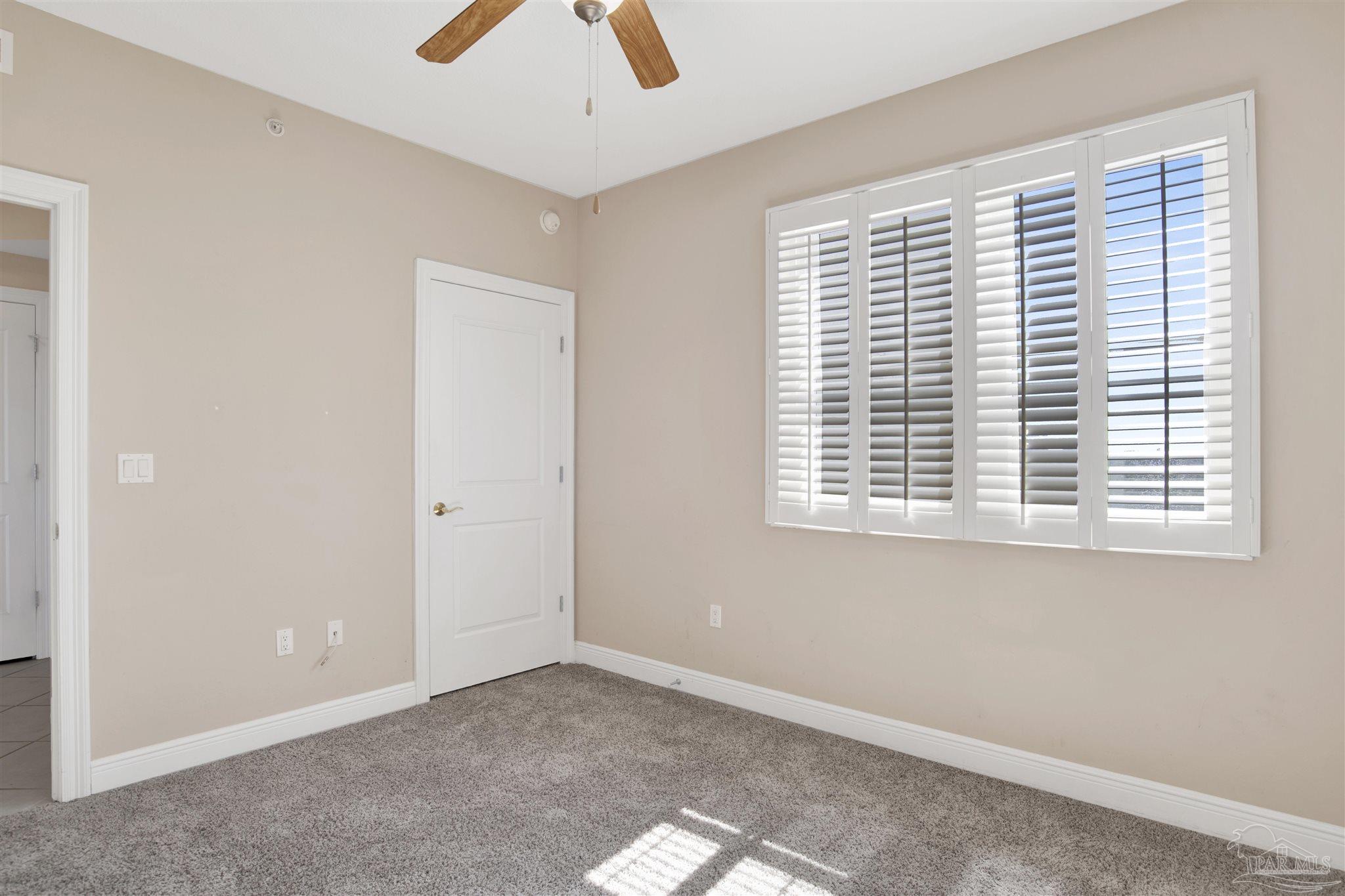 608 Lost Key Drive, Unit 701C Pensacola, FL 32507 - Photo 9 of 32 an empty room with a window