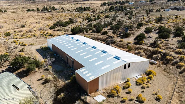 a view of an ocean beach and mountain