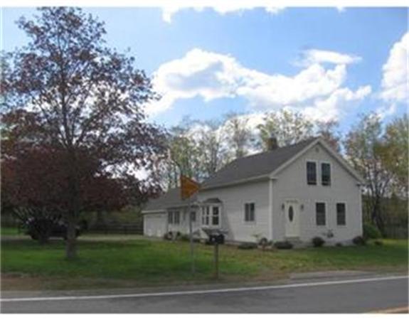 215 State Road Whately, MA 01373 - Photo 1 of 9 a front view of a house with a garden