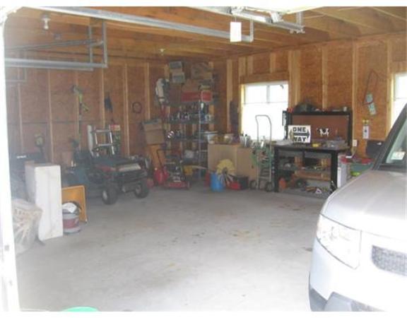 215 State Road Whately, MA 01373 - Photo 9 of 9 a living room filled with furniture