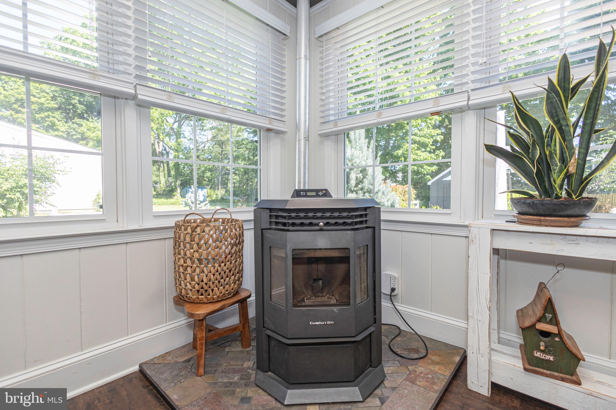 7 Colonial Ridge Drive Yardley, PA 19067 - Photo 25 of 68 Pellet Stove in Dining Area