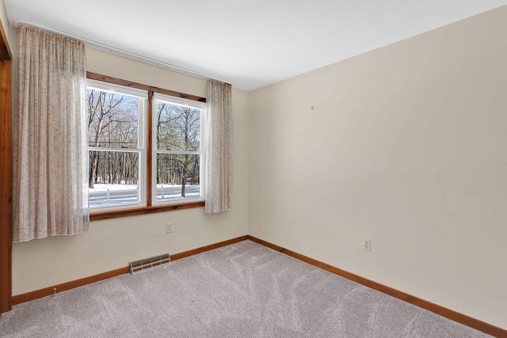 433 Ventura Street Ludlow, MA 01056 - Photo 14 of 39 a view of an empty room with a window