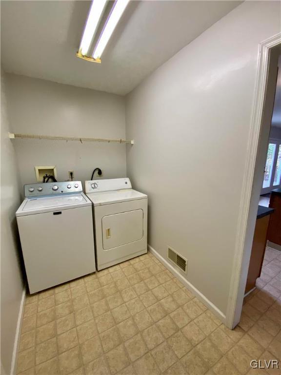 4755 McDermott Road Bangor, PA 18013 - Photo 14 of 37 a utility room with dryer and washer