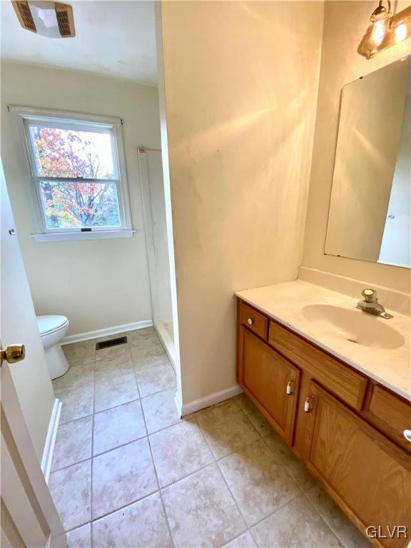4755 McDermott Road Bangor, PA 18013 - Photo 22 of 37 a bathroom with a sink a toilet and a mirror