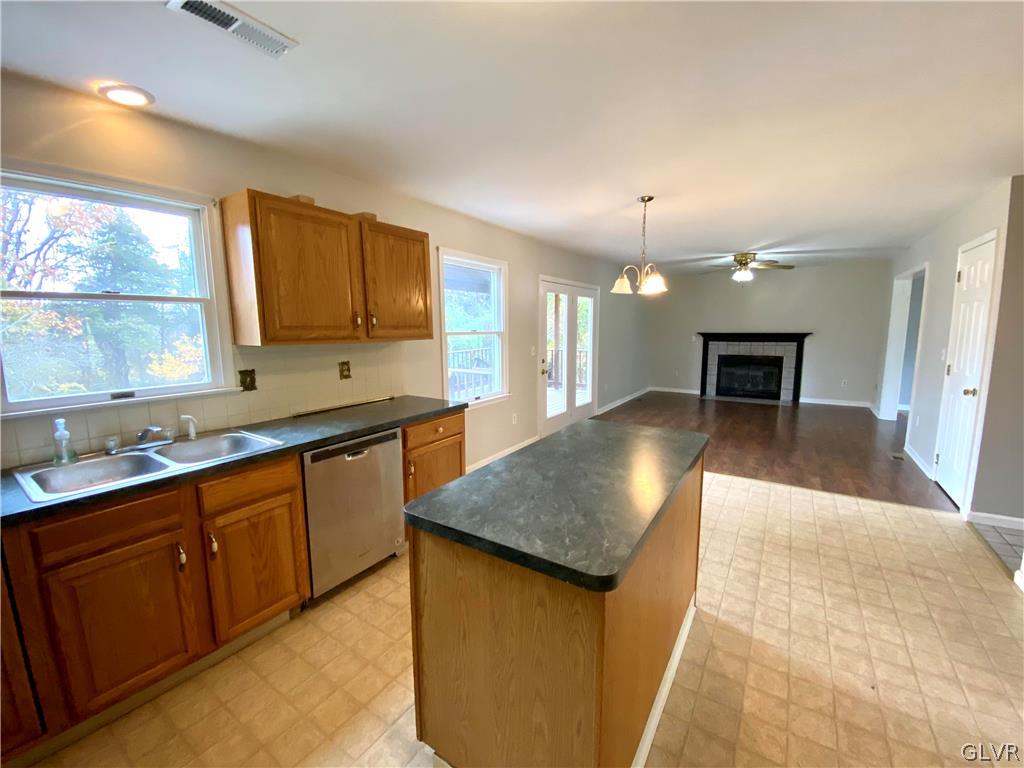 4755 McDermott Road Bangor, PA 18013 - Photo 10 of 37 a kitchen with stainless steel appliances granite countertop a sink counter space and cabinets