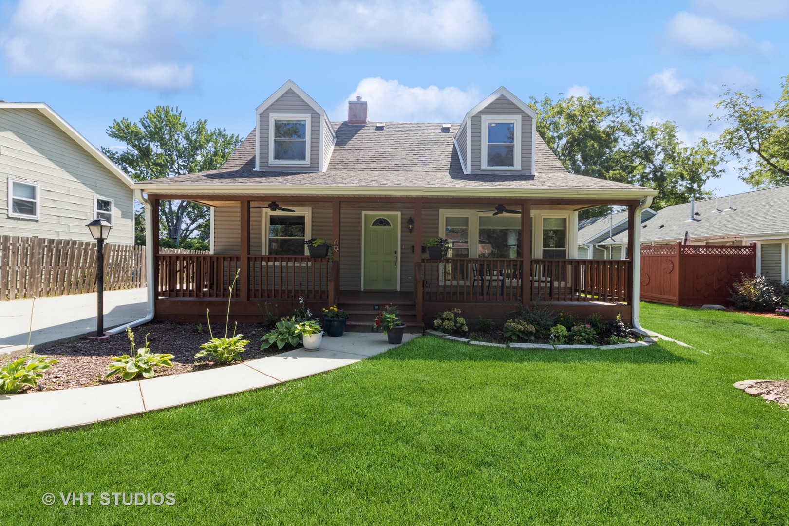 49 South Quentin Road Palatine, IL 60067 - Photo 1 of 25 a view of a house with a yard and plants