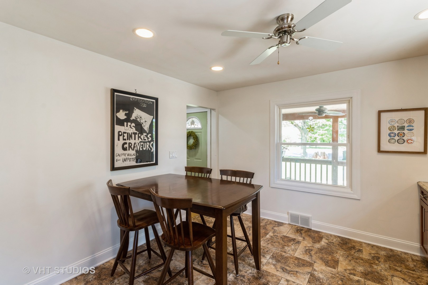 49 South Quentin Road Palatine, IL 60067 - Photo 11 of 25 a view of a dining room with furniture and a window