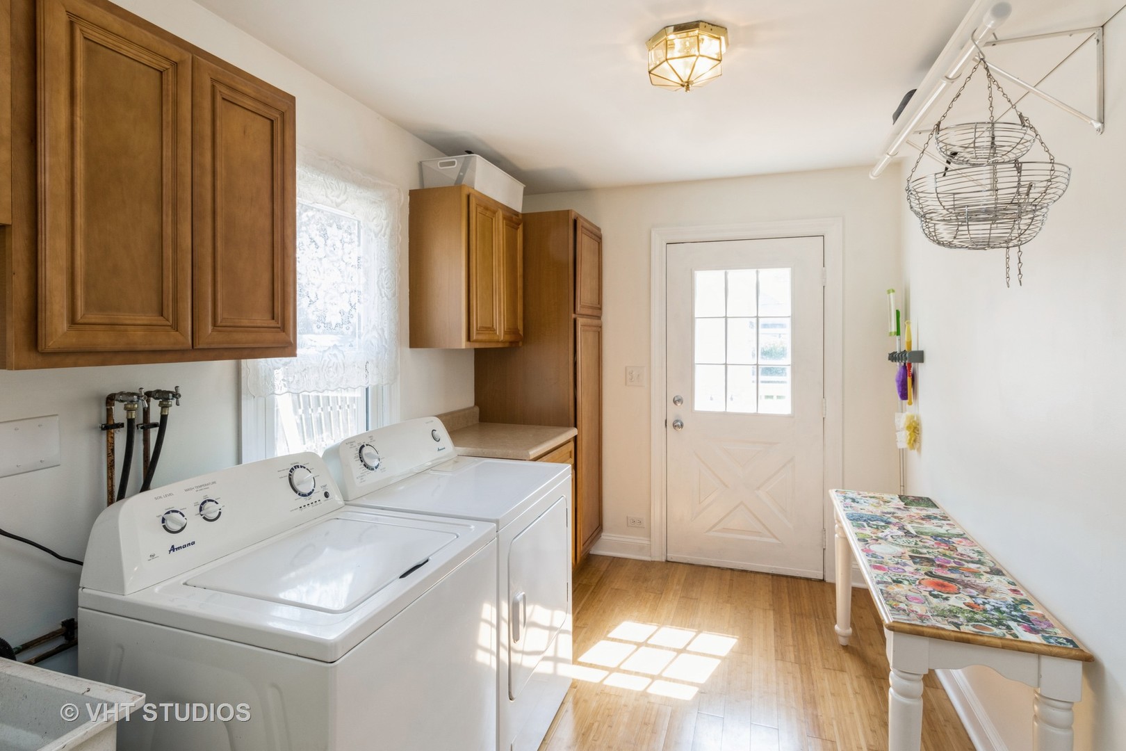 49 South Quentin Road Palatine, IL 60067 - Photo 12 of 25 a utility room with a window dryer and washer