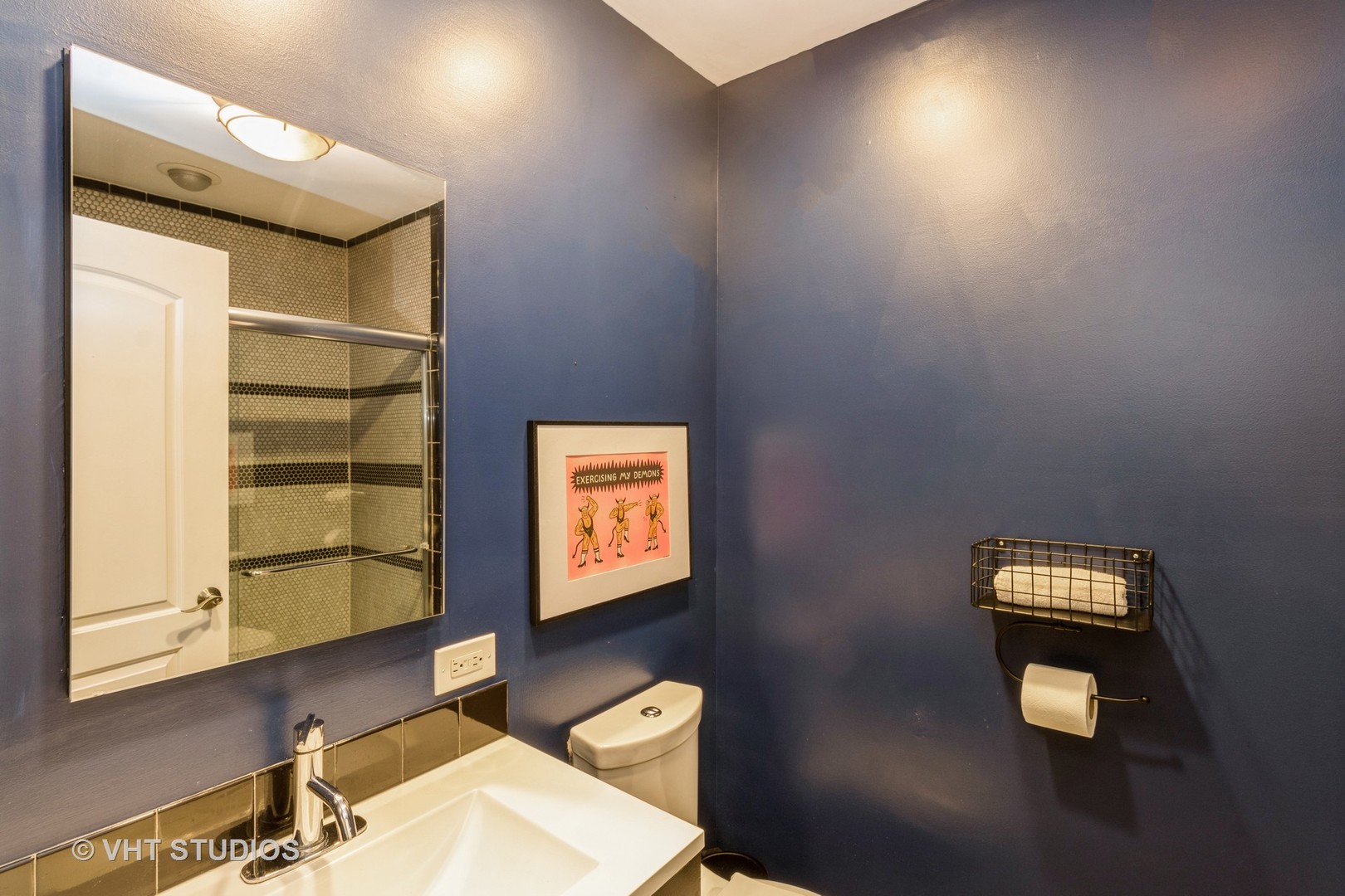 49 South Quentin Road Palatine, IL 60067 - Photo 13 of 25 a bathroom with a toilet a sink and mirror