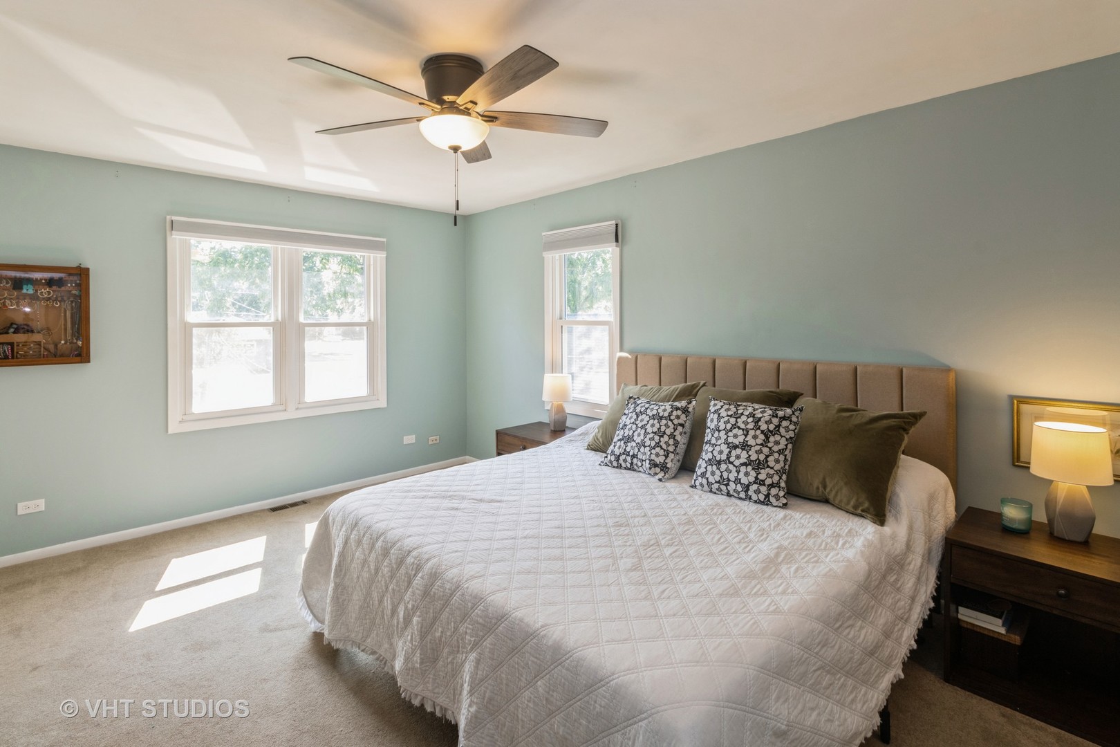 49 South Quentin Road Palatine, IL 60067 - Photo 18 of 25 a bedroom with a large bed large window with wooden floor