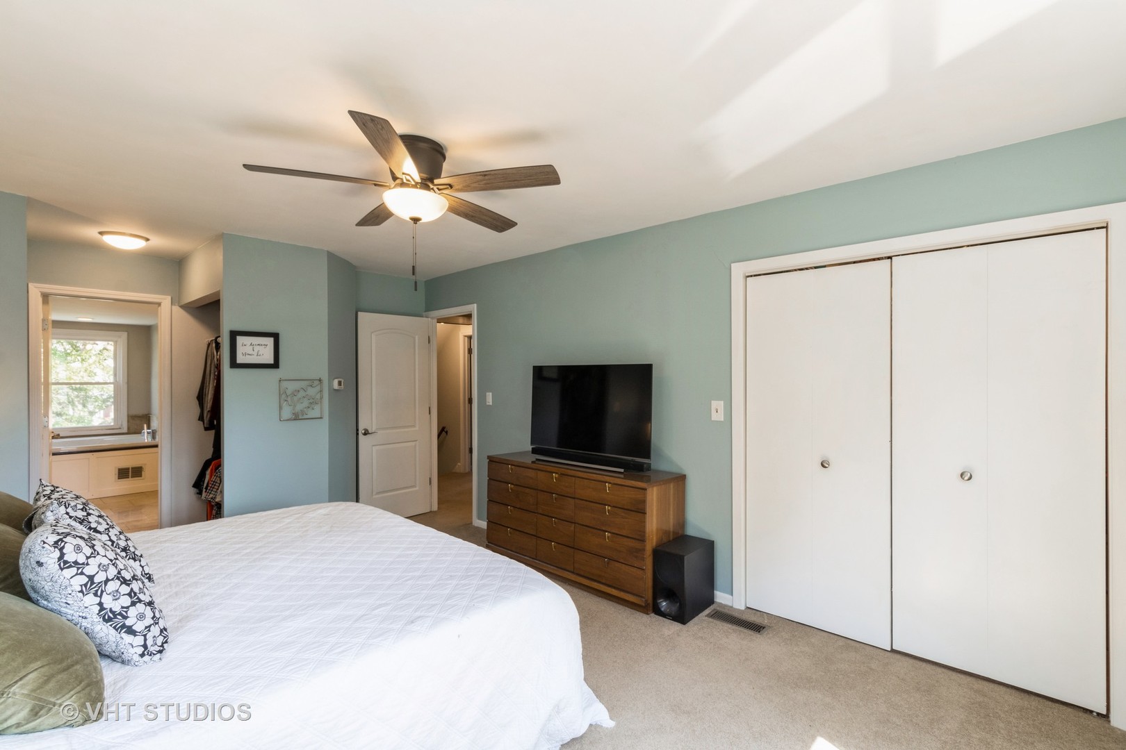 49 South Quentin Road Palatine, IL 60067 - Photo 19 of 25 a bedroom with a bed and a flat screen tv