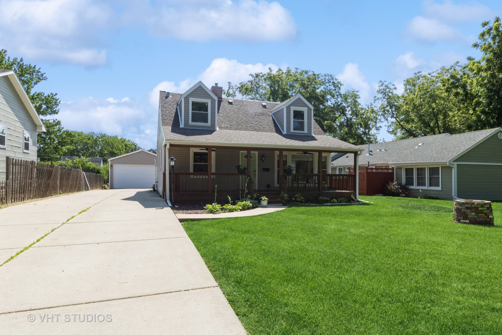 49 South Quentin Road Palatine, IL 60067 - Photo 2 of 25 a front view of a house with a yard