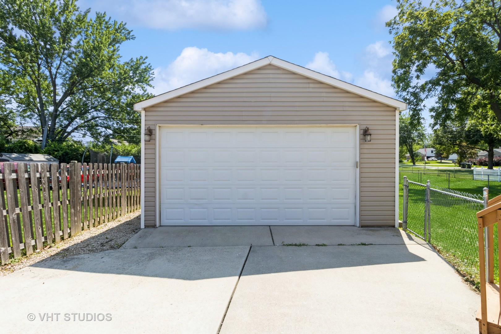 49 South Quentin Road Palatine, IL 60067 - Photo 25 of 25 a front view of a house with a yard
