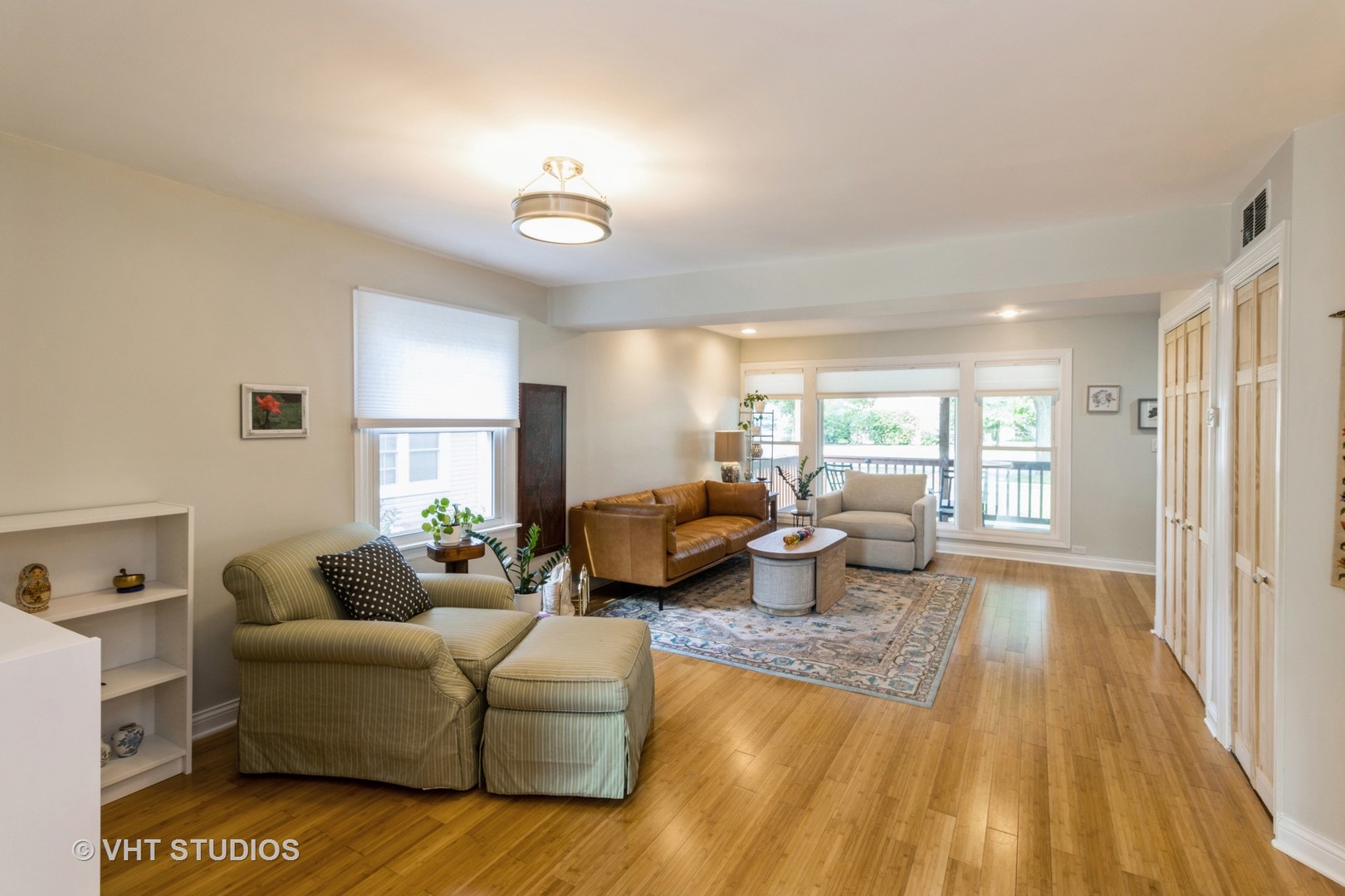 49 South Quentin Road Palatine, IL 60067 - Photo 5 of 25 a living room with furniture and a large window