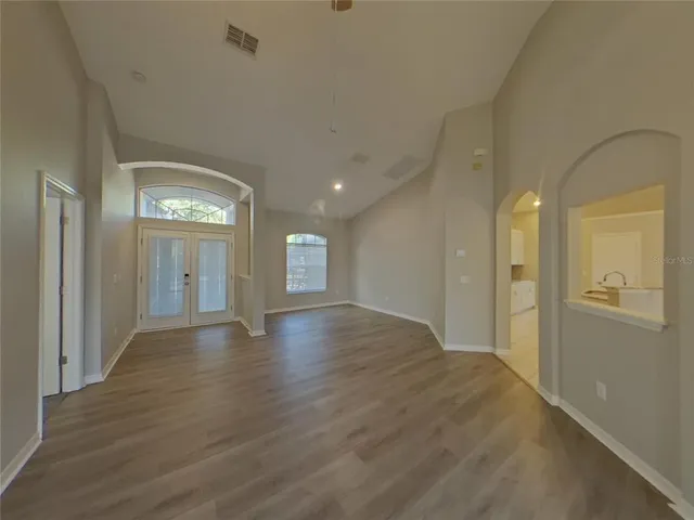 a view of an empty room and window