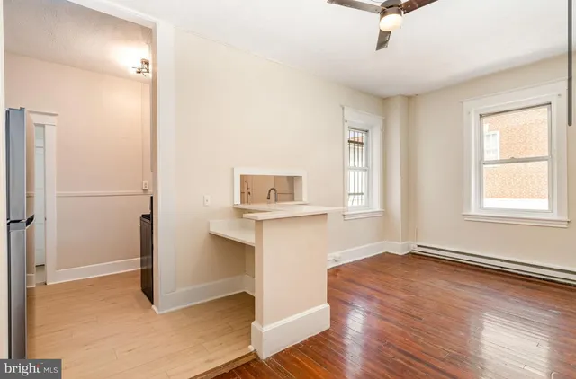 a kitchen with a stove and a microwave