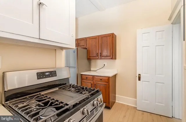 a bathroom with a bathtub and a toilet