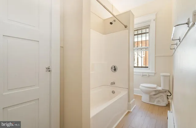 a picture of a bench in a mirror