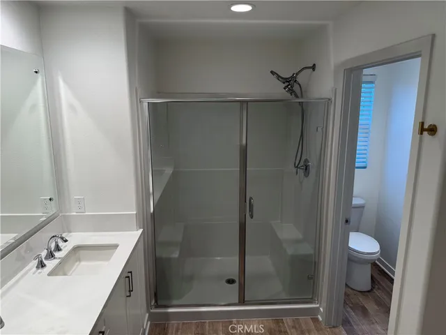 a bathroom with a bathtub and a toilet