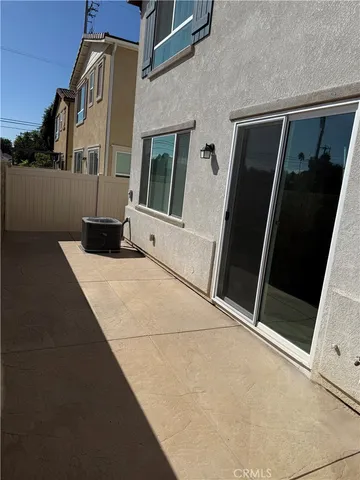 a view of building with glass door