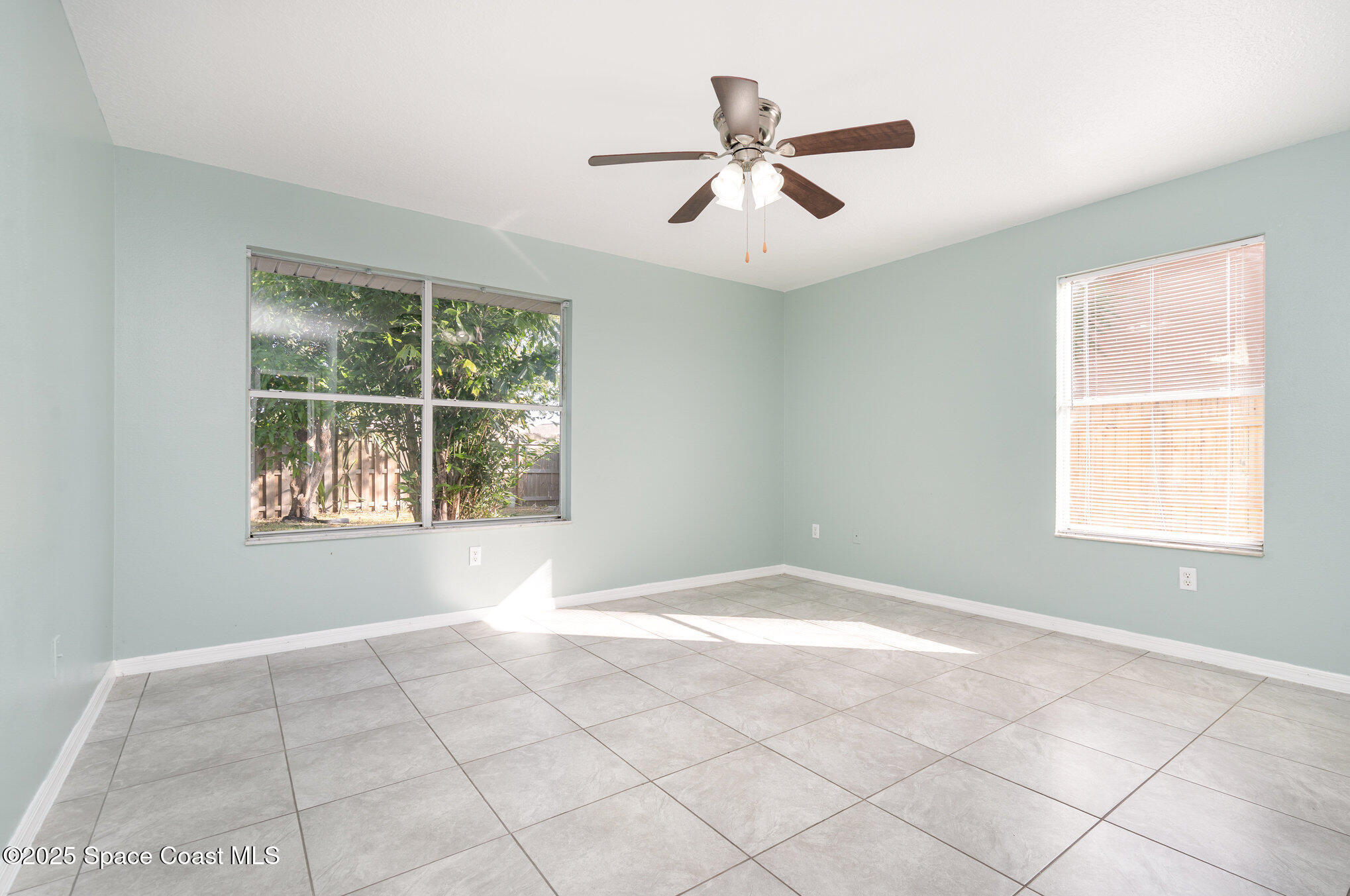 636 Fishtail Palm Boulevard Melbourne, FL 32901 - Photo 12 of 25 a view of an empty room with a window