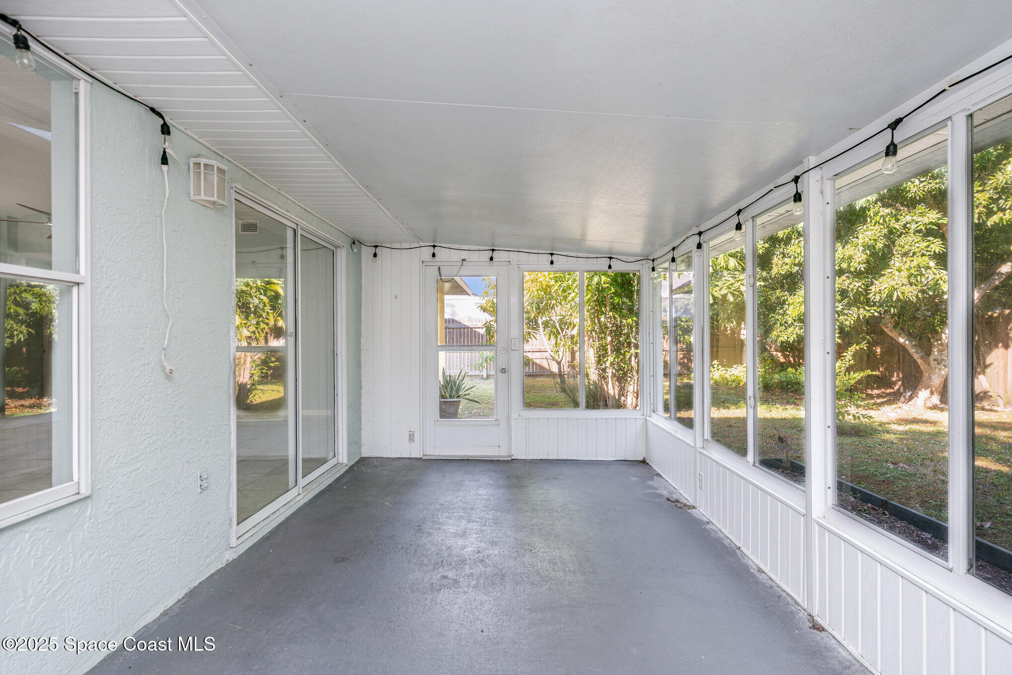 636 Fishtail Palm Boulevard Melbourne, FL 32901 - Photo 24 of 25 a view of entryway with wooden floor