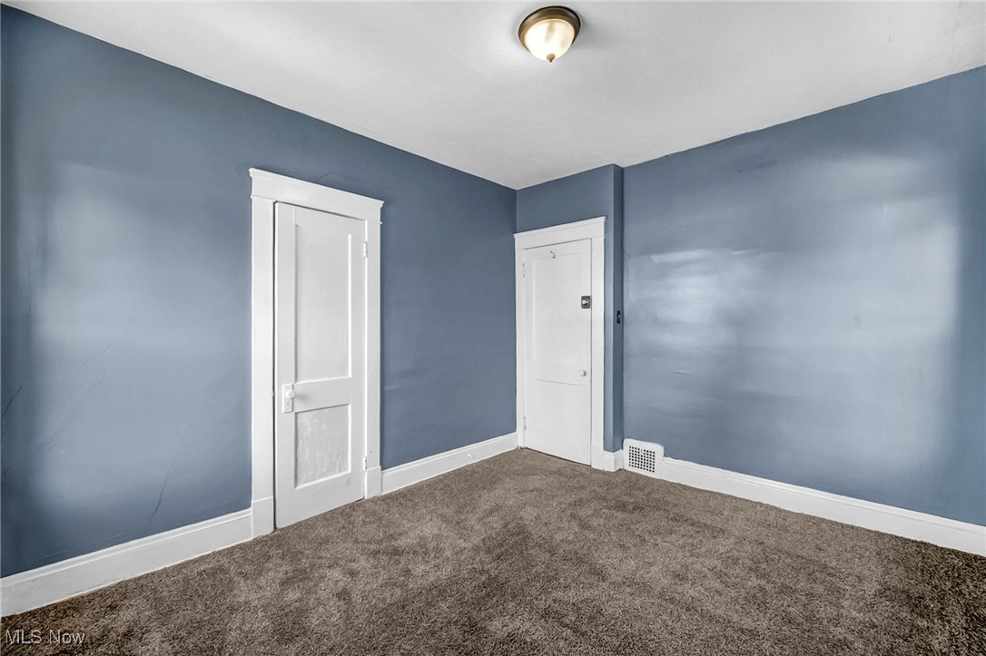 1854 Grantham Road Cleveland, OH 44112 - Photo 23 of 47 Spare room with carpet and baseboards
