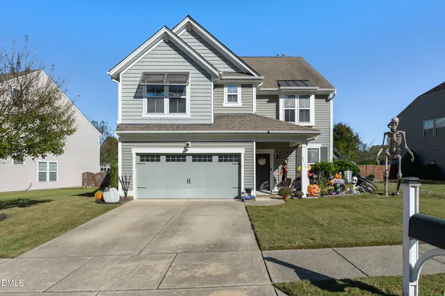a view of a house with outdoor seating area