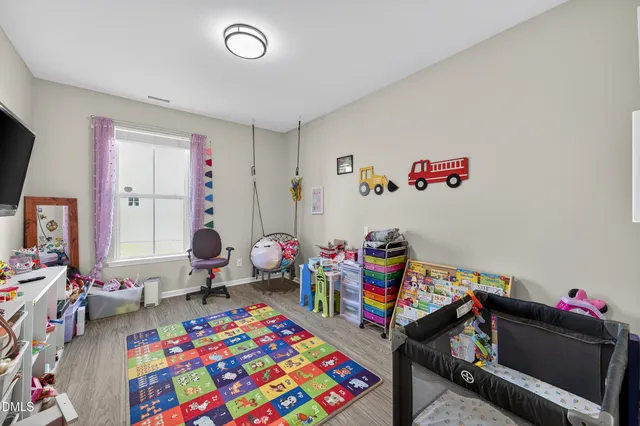 a living room with furniture or couch and a fireplace