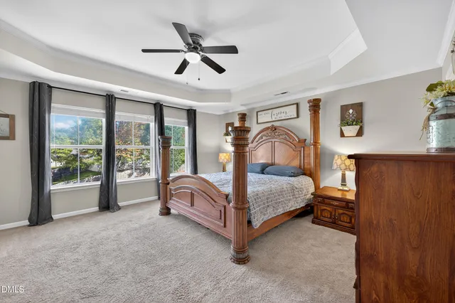 a bed room with furniture and a window