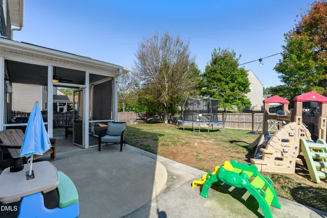 a living room with furniture and a yard
