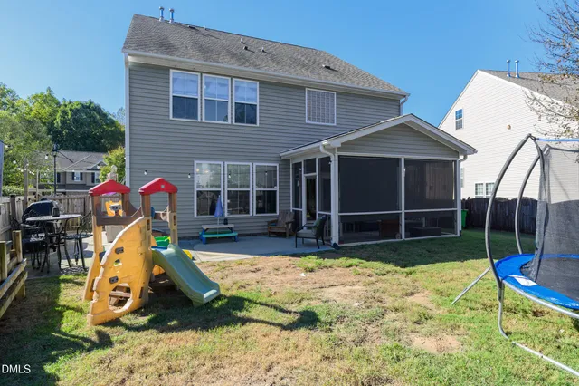 a view of a yard with patio