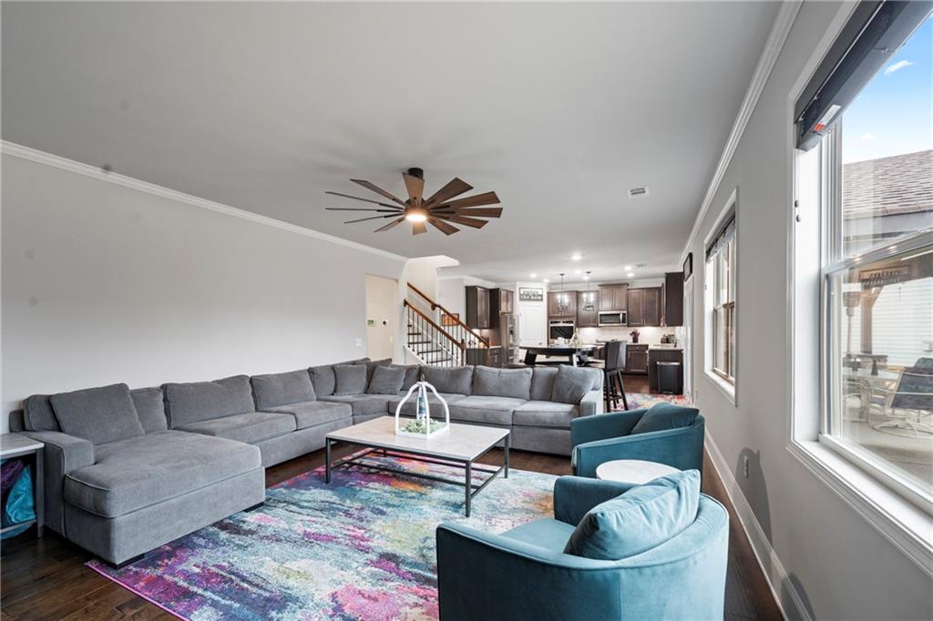 6780 Rambling Vale Dawsonville, GA 30534 - Photo 17 of 53 a living room with furniture and a large window