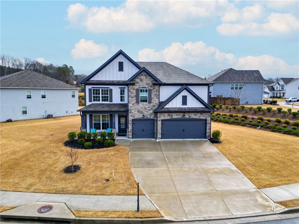 6780 Rambling Vale Dawsonville, GA 30534 - Photo 47 of 53 a front view of a house with garden