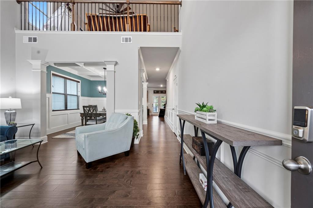 6780 Rambling Vale Dawsonville, GA 30534 - Photo 5 of 53 a living room with furniture and wooden floor