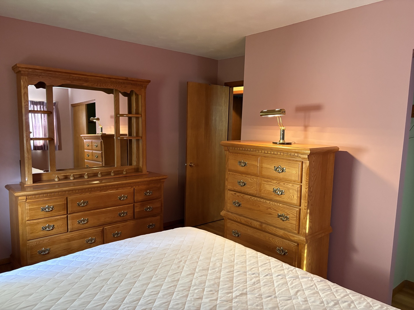 215 Phyllis Avenue Rochelle, IL 61068 - Photo 11 of 27 a bedroom with a bed and a dresser