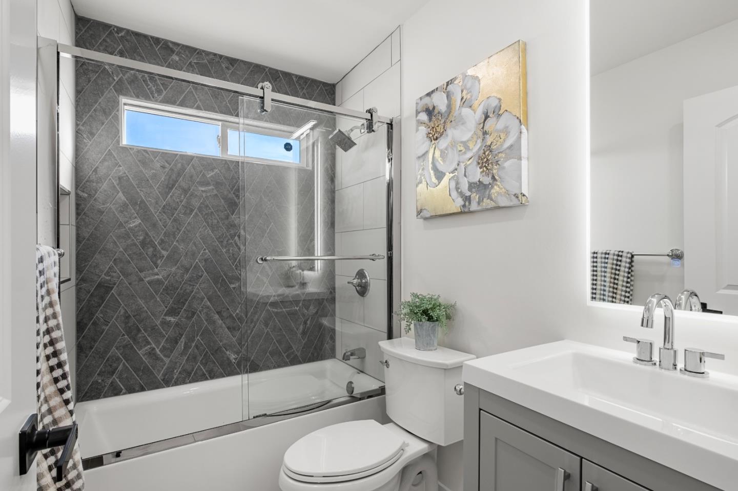 1014 Viewpointe Boulevard Rodeo, CA 94572 - Photo 12 of 20 a bathroom with a sink toilet and shower