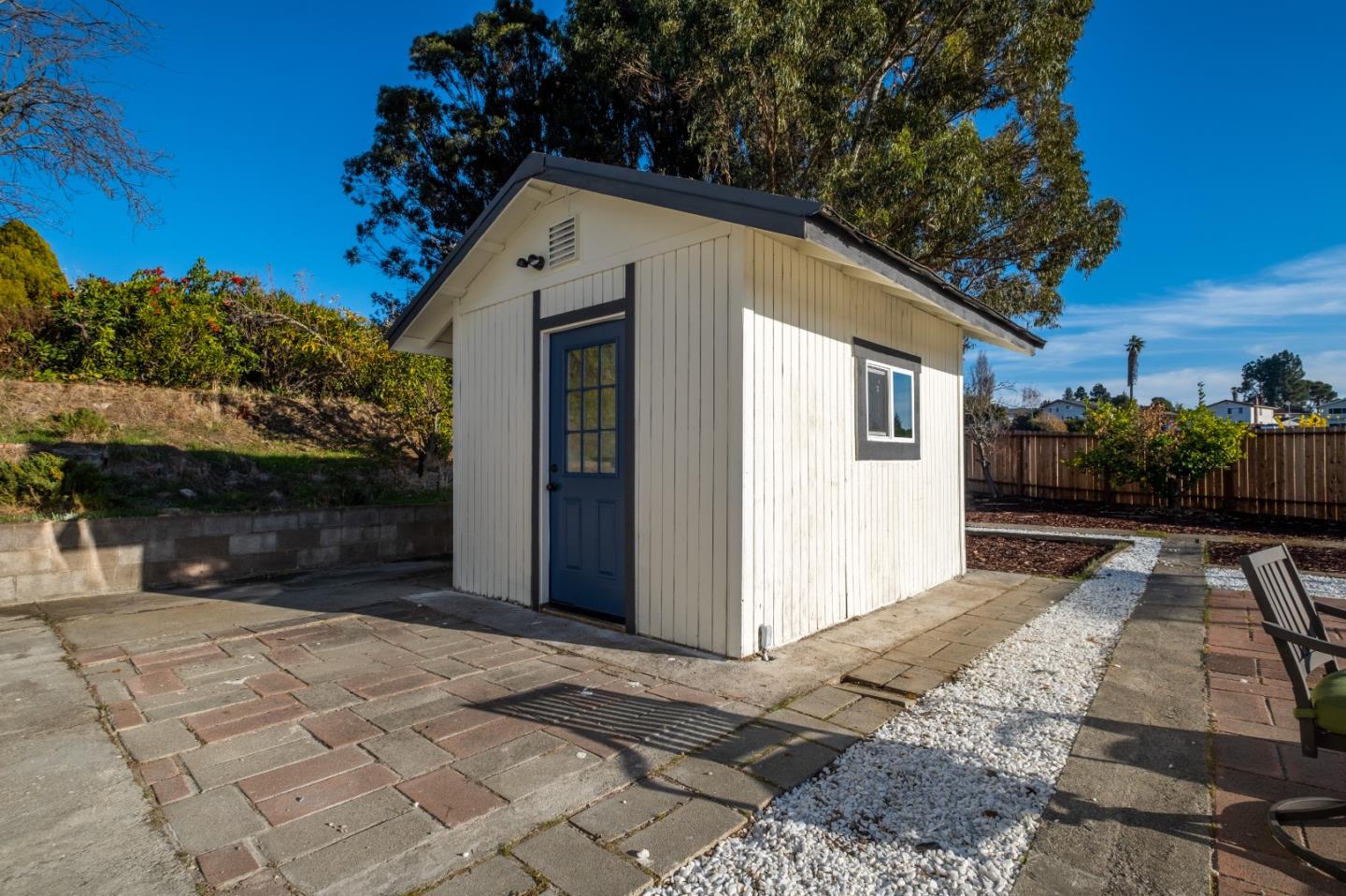 1014 Viewpointe Boulevard Rodeo, CA 94572 - Photo 15 of 20 a view of a white house with a yard