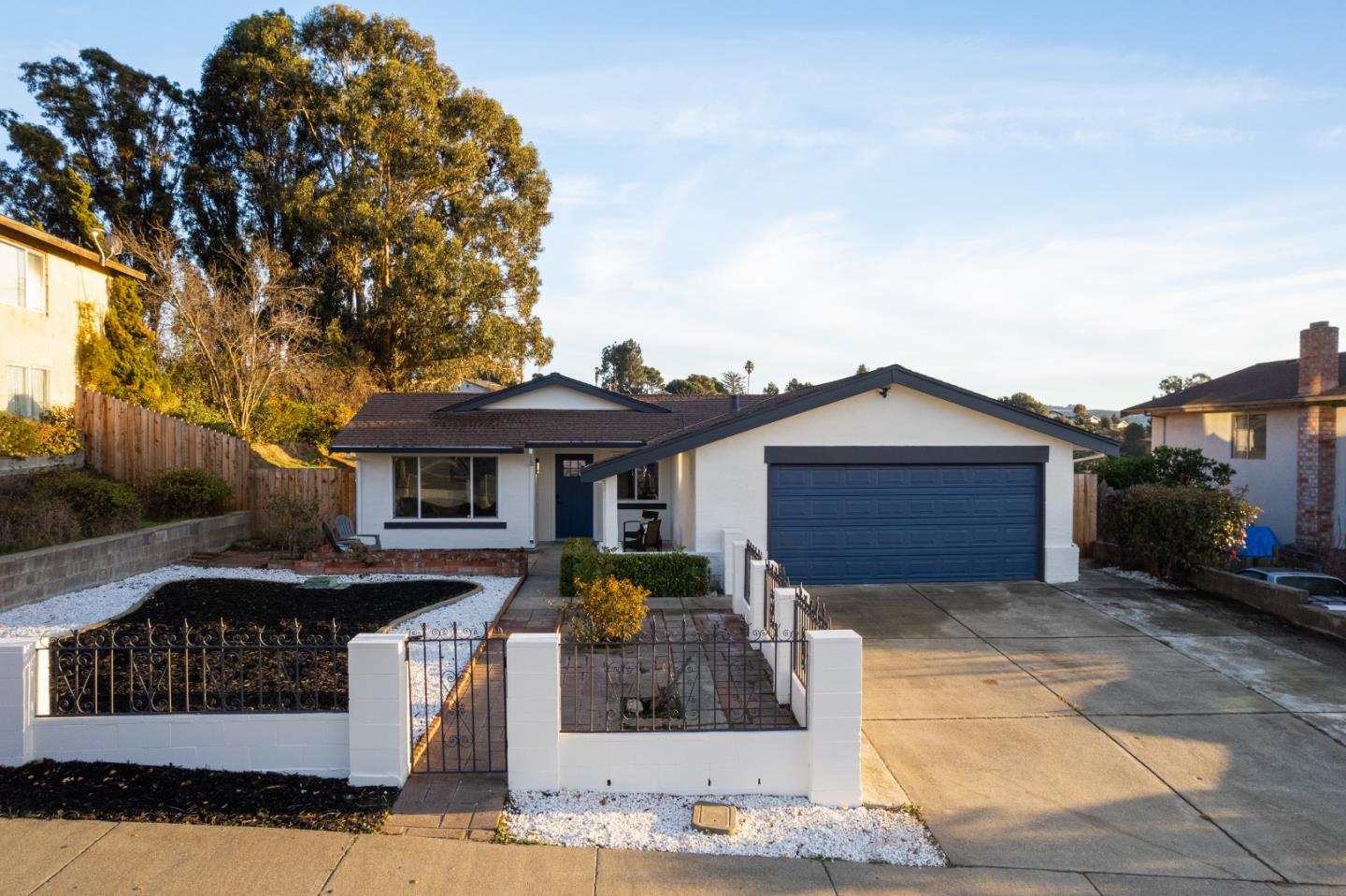 1014 Viewpointe Boulevard Rodeo, CA 94572 - Photo 2 of 20 a front view of a house with garden