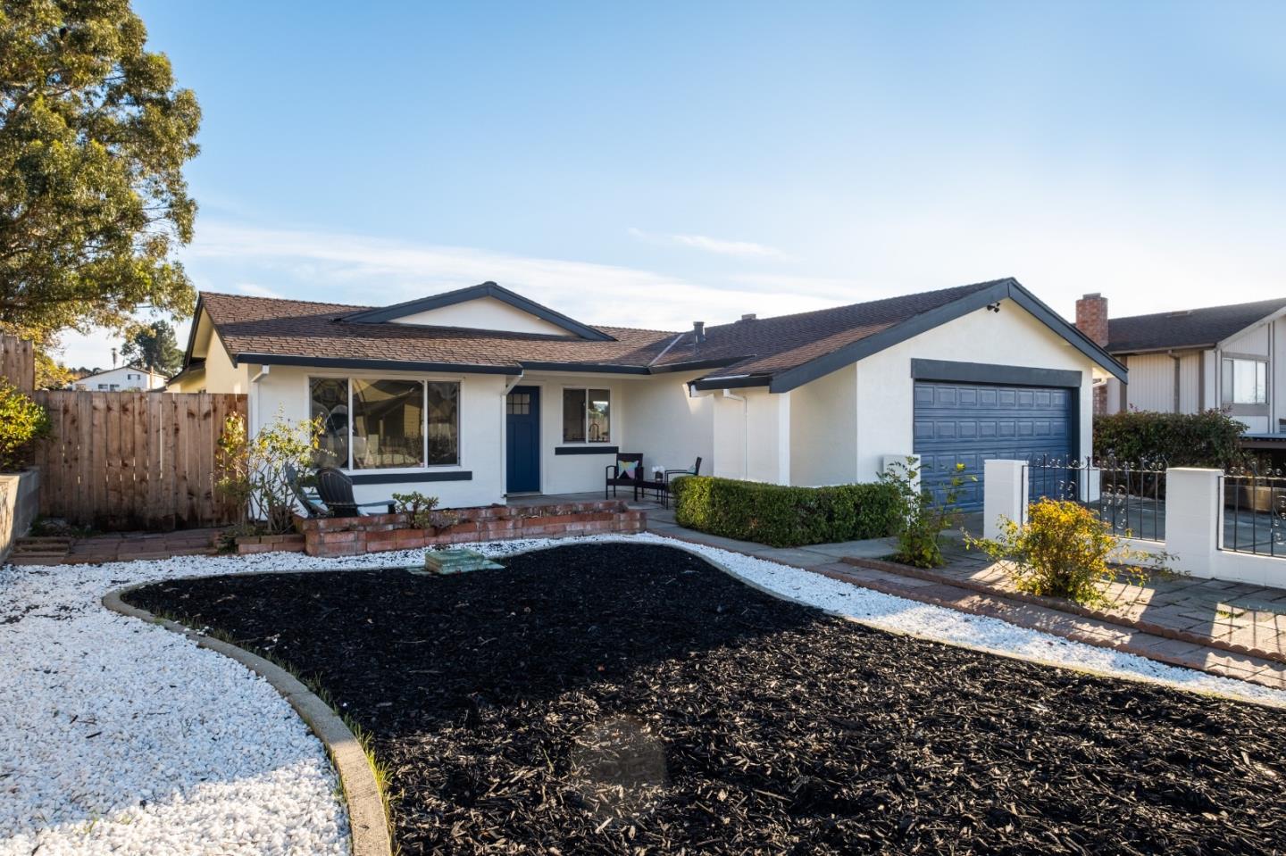 1014 Viewpointe Boulevard Rodeo, CA 94572 - Photo 3 of 20 a front view of a house with a yard