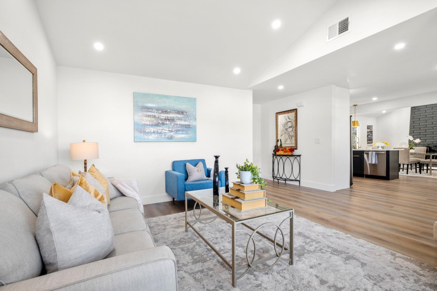 1014 Viewpointe Boulevard Rodeo, CA 94572 - Photo 5 of 20 a living room with furniture and a wooden floor