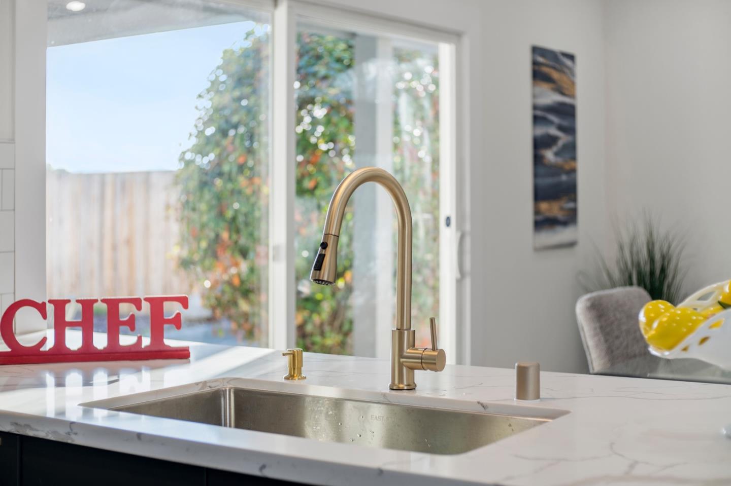 1014 Viewpointe Boulevard Rodeo, CA 94572 - Photo 7 of 20 a view of kitchen with a sink and living room