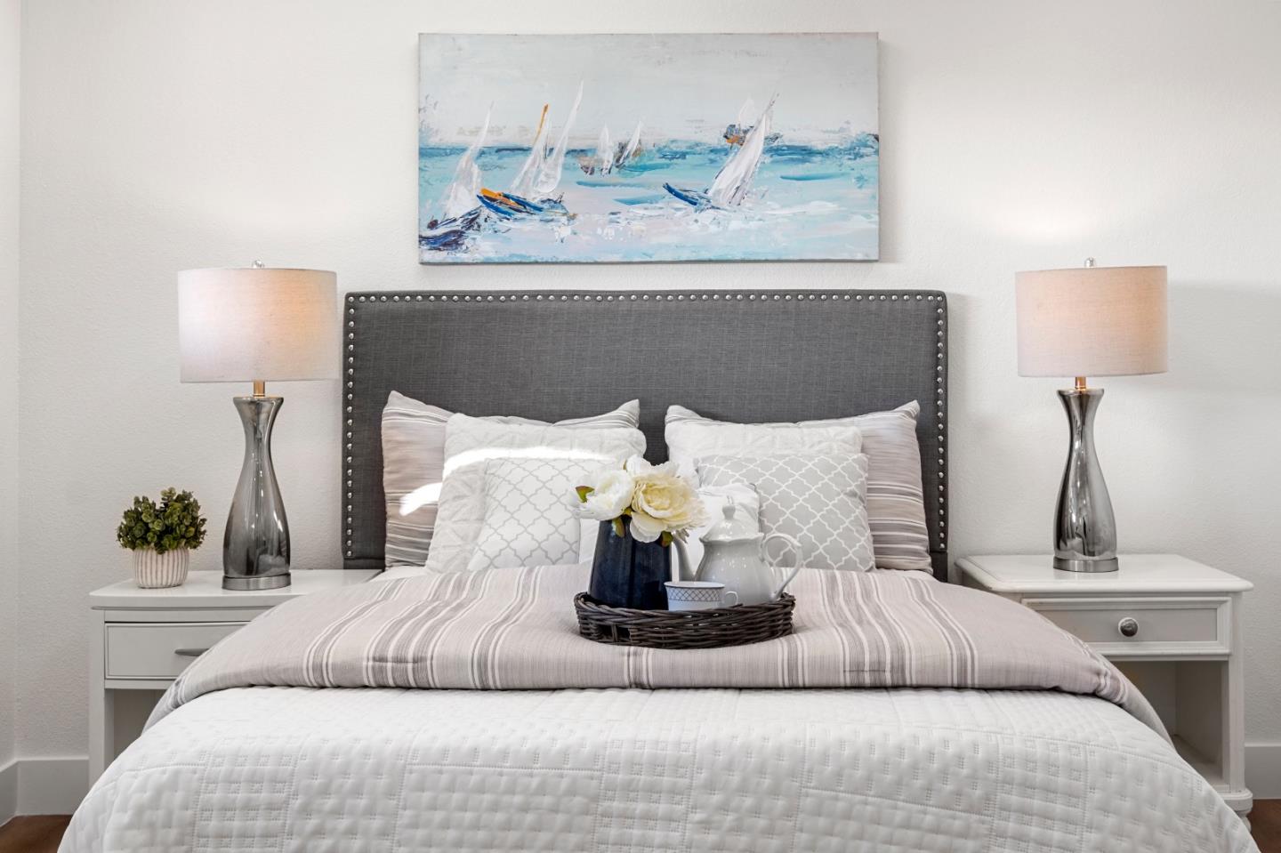 1014 Viewpointe Boulevard Rodeo, CA 94572 - Photo 8 of 20 a bedroom with bed and lamp